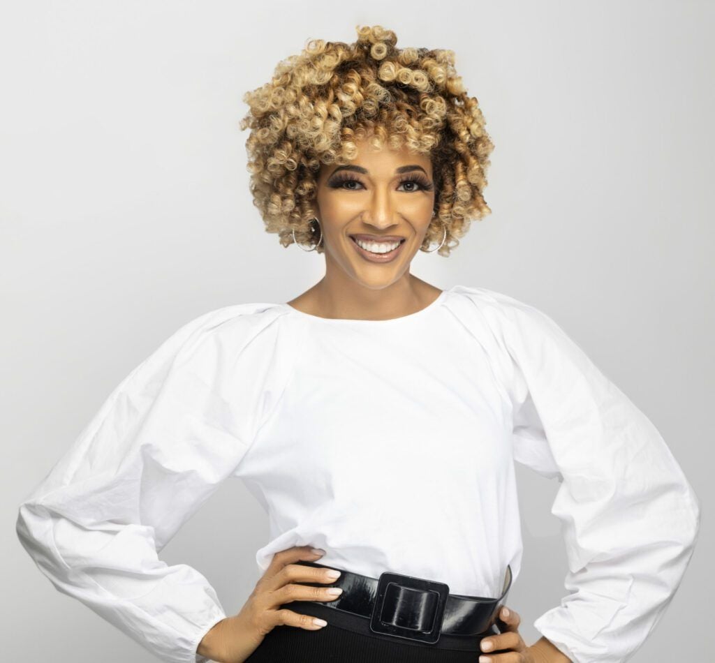 Jennifer Dupoux in white blouse